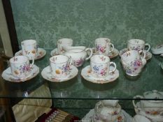 A Royal Crown Derby 'Derby Posies' part coffee set including eight coffee cans, seven saucers,