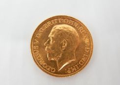 A 1913 George V, Gold sovereign, 8.04gm.
