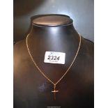 A 9ct gold cross pendant on a twist rope chain in Rackhams case, weight 1.64g.