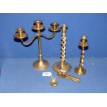 A quantity of Brass items to include candelabra, two twist stem candlesticks,