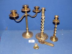 A quantity of Brass items to include candelabra, two twist stem candlesticks,