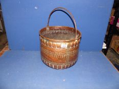 A beaten Copper coal bucket, 12 1/2'' x 13'' x 11'' high.