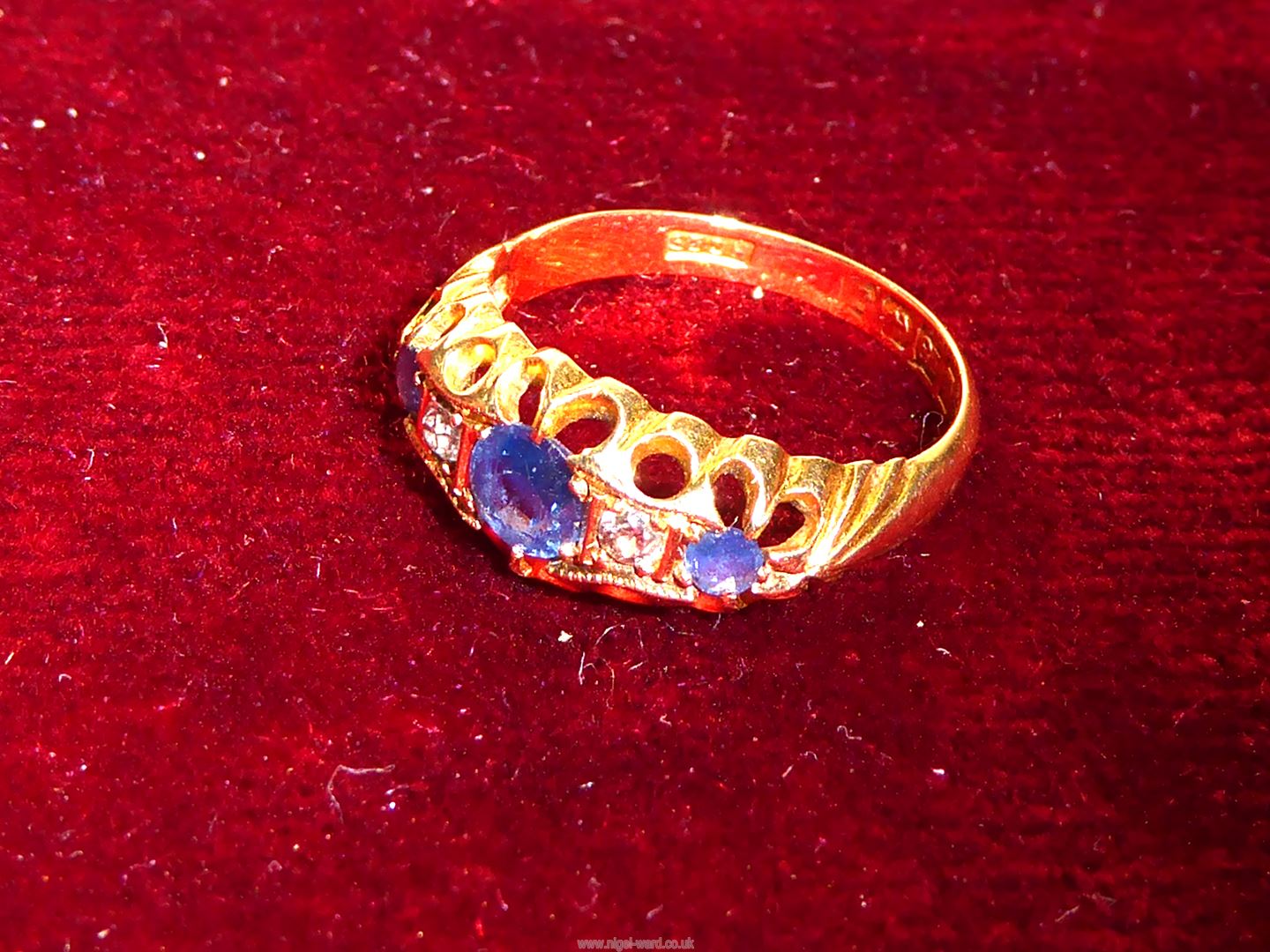 An 18ct gold Engagement ring, two diamonds flanked by central sapphire and two smaller sapphires, - Image 3 of 4