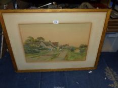 An early 20th century watercolour village scene signed F.G. Fraiers.