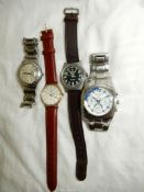 Four gentlemen's quartz movement wristwatches including a Swatch with unusual; day/date windows,
