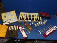 A quantity of cased and loose plated cutlery, cased horn handle steak knives and forks,