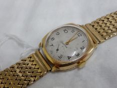 A stylish Vertex 9 carat gold cased quartz movement gentleman's wristwatch having a silver coloured