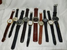 A lidded wooden box containing ten gentlemen's wristwatches including RJW quartz with