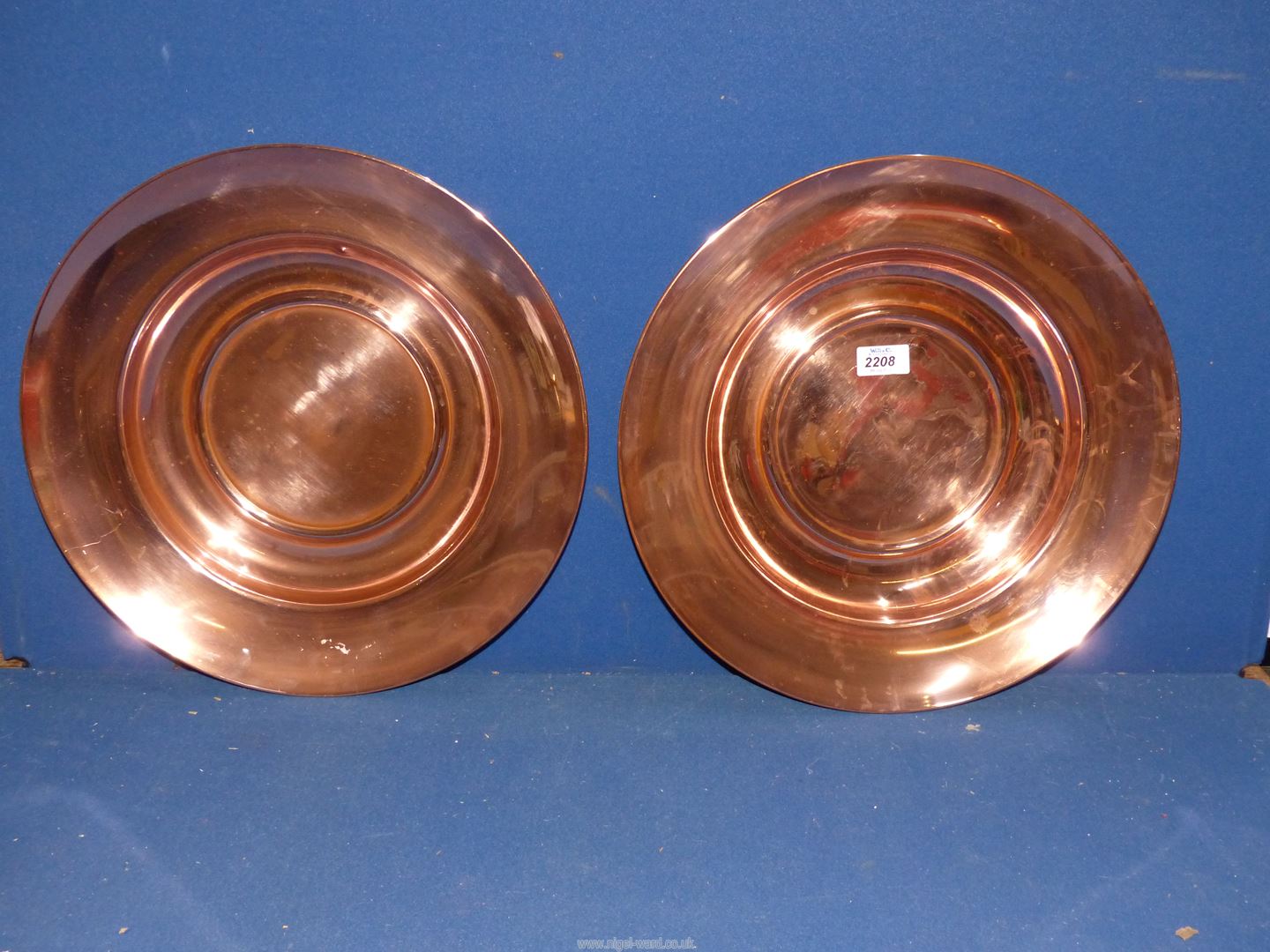 A pair of large 19th century Copper chargers, both 16" diameter.