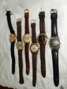 Seven gentlemen's wristwatches with straps including an 18 carat gold cased Cortebert Envoy,