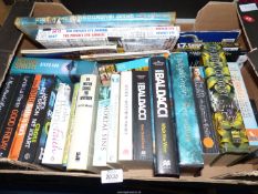 A box of novels to include Wilbur Smith, James Patterson, David Baldacci etc.