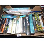 A box of novels to include Wilbur Smith, James Patterson, David Baldacci etc.