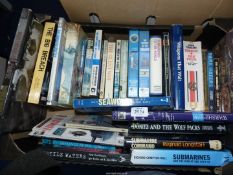 A box of books on submarine warfare to include Hostile Waters, Seawolf, Iron Coffin by Herbert A.