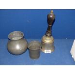 Two Pewter pots and a brass school bell.