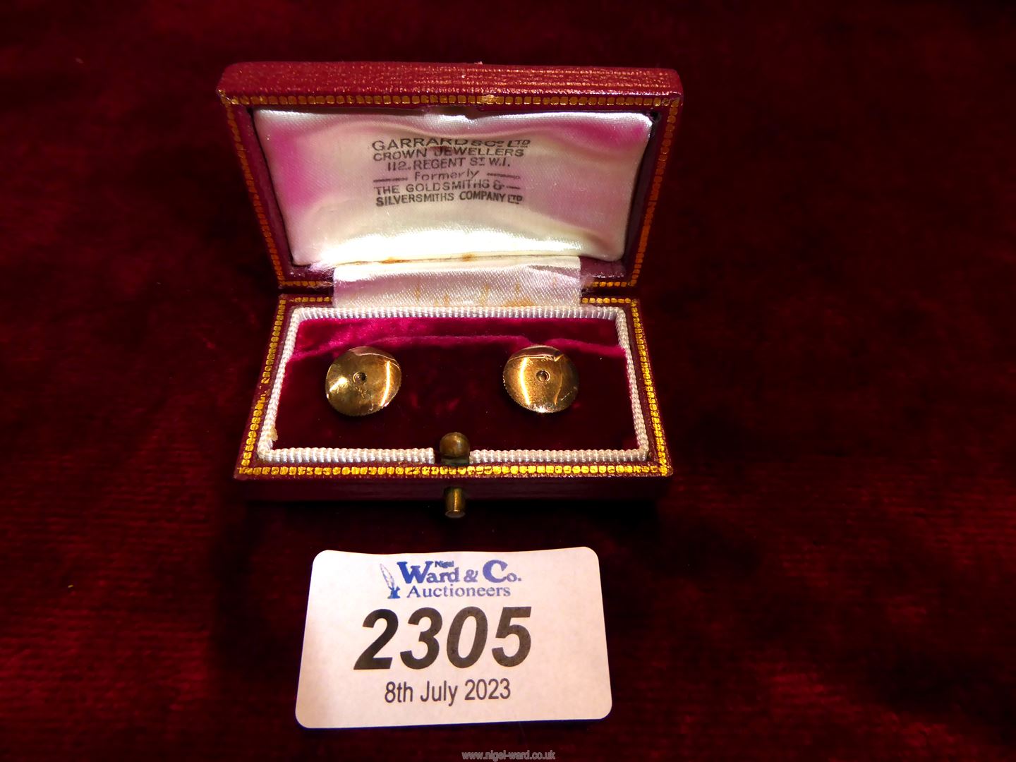 A pair of 9ct gold dress shirt studs for Garrard & Co.