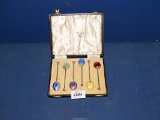 A set of six Birmingham Silver and enamel coffee spoons , four spoons dated 1948,