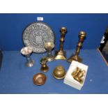A quantity of copper and brass including candlesticks, weights, bells, etc.