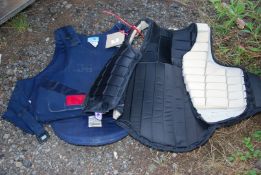 Two Body Protectors - Size: Large.
