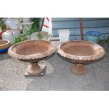 A pair of antique cast iron urn shaped Planters, 30" diameter x 19" x 18".
