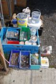 Two boxes of used paints, nails, screws, staples, etc.