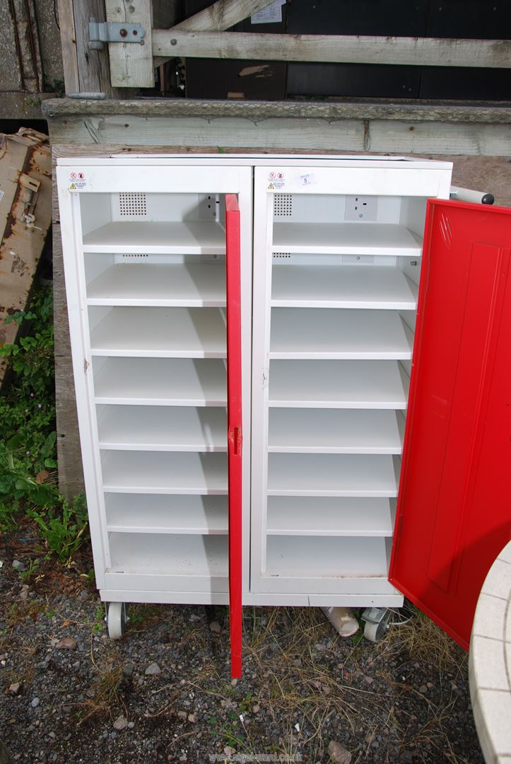 A storage cabinet with shelves on swivel castors, 30" x 18" x 47" high. - Image 2 of 2