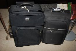 Two Antler black Suitcases.