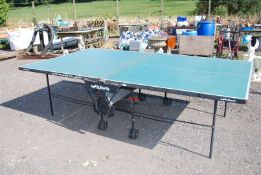 A 'Butterfly' outdoor table tennis table 8ft x 60'' x 30" high.