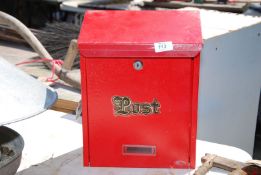 Red metal post box - no key.