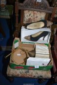 A quantity of Beatrix Potter books, a hunting horn and pair of Kurt-Geiger high heel shoes.