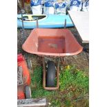 Plastic wheelbarrow with pneumatic tyre.