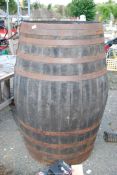 A large cooper-made cider barrel, 50 1/2" high x 27" diameter.