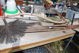 Wooden handled chimney brush set.