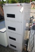 A 4 drawer filing cabinet.