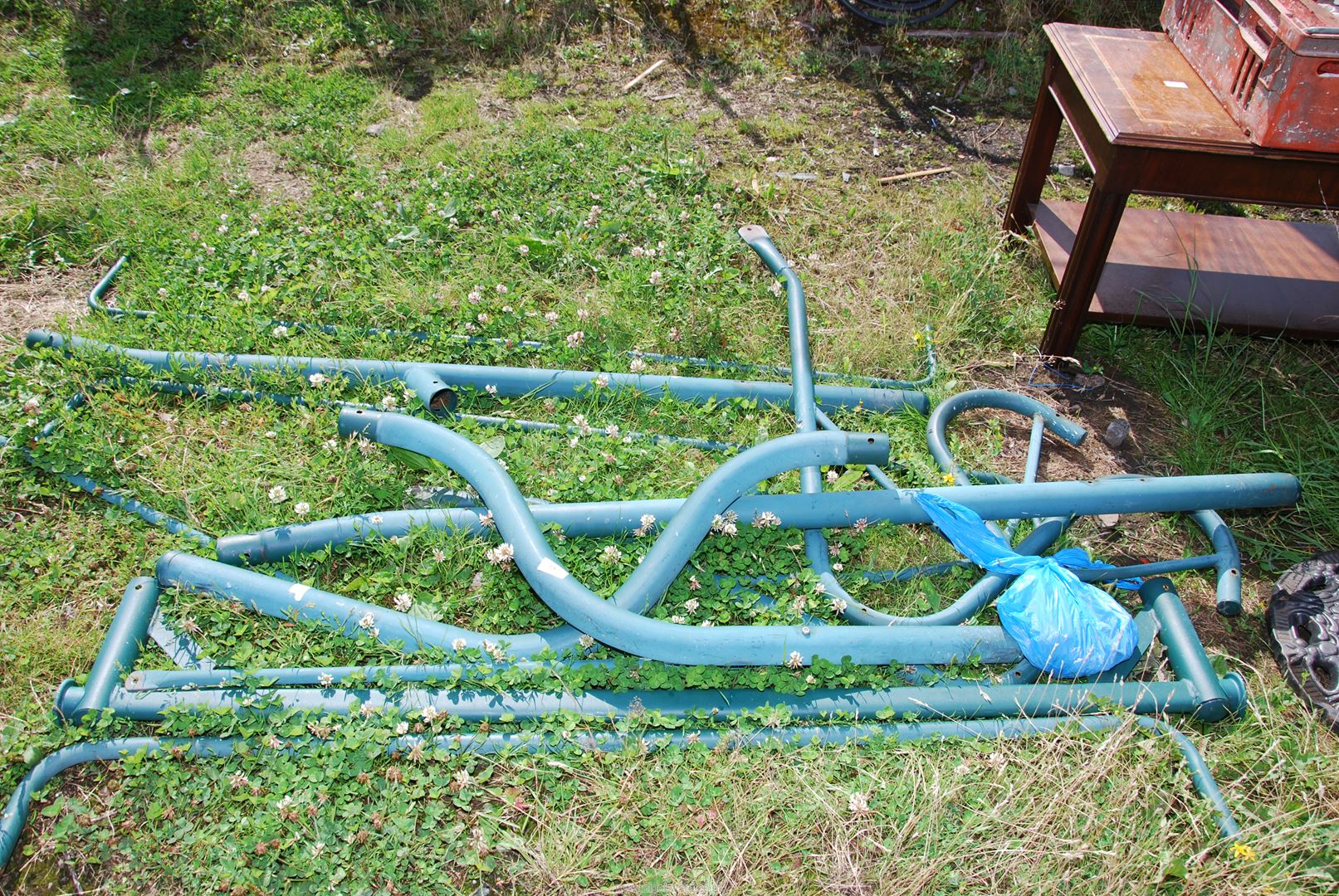 Swinging garden seat for re-assembly.