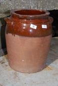 A part glazed terracotta urn, 16" high x 10 1/2" diameter.