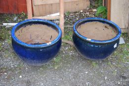 Two blue glazed planters,.