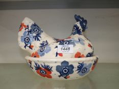 An Emma Bridgewater Hen on Nest ceramic egg container, anemone design.