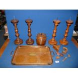 A quantity of treen to include; four pricket stands, biscuit barrel, tray with brass handles, etc.