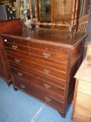 An Edwardian Mahogany Chest of three long and two short Drawers having pierced backplate brass drop