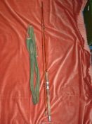 A Martinez & Bird splite cane 6' 9" spinning rod.