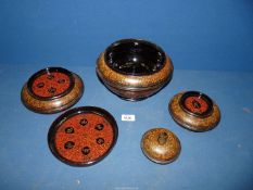 A lacquer and bamboo food offering vessel, divides into five bowls, possibly Burmese,
