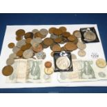 A quantity of English coins and notes, commemorative crowns, etc.