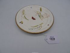 A Minton aesthetic type plate painted with flowers and insects, date cypher for 1874,