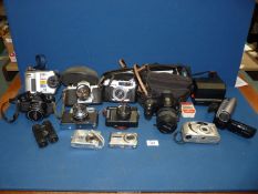 A quantity of cameras including Polaroid 600 land camera, Fujifilm Finepix S6500fd digital camera,