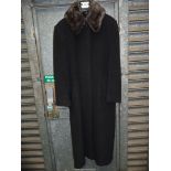 A ladies grey Viyella coat with fur collar, size 12.