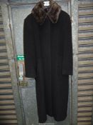 A ladies grey Viyella coat with fur collar, size 12.