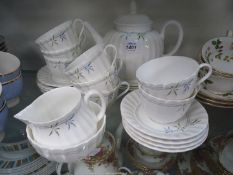A Royal Worcester 'Green Bamboo' part tea service for eight,