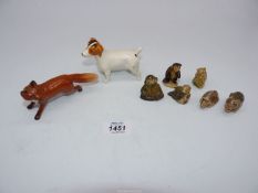 Two Beswick figures of Fox and Jack Russell and six Wade Whimsies.