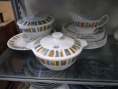 An Alfred Meakins 'Glo-White' dinner service in 'Cranbrook' pattern.