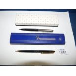 A boxed Parker pen and a boxed Waterman pencil, both with instructions.